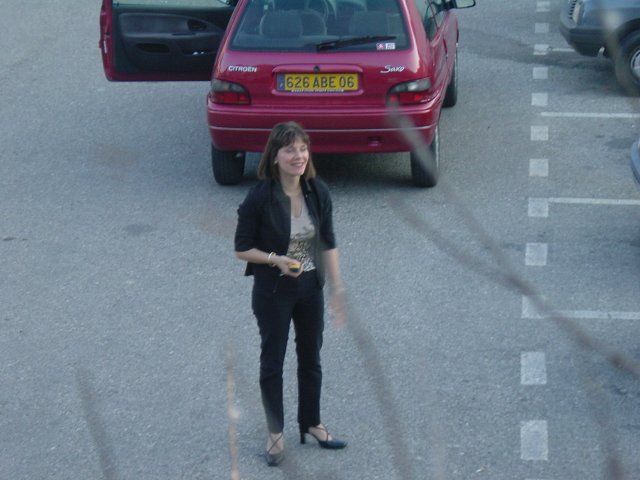 Sophie on the parking lot in front of our home