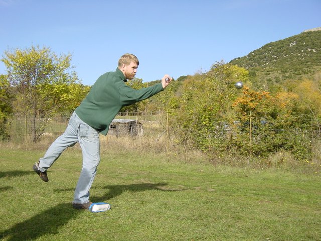 Ted throwing his body and the boule