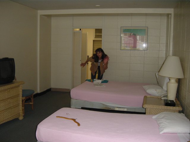 Our new room at the Hawaiiana Hotel, Caroline in the background
