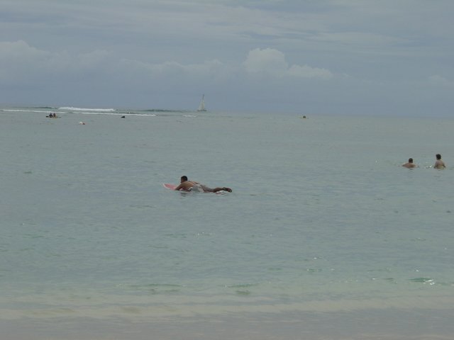 Female surfer at sea