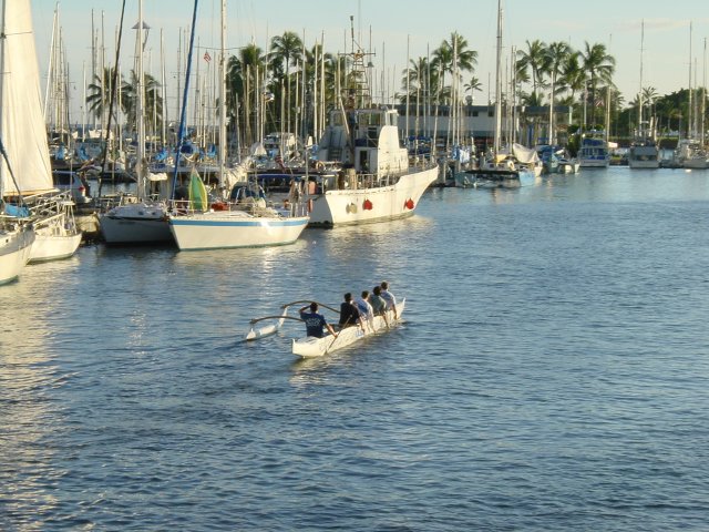 "Beach Boys" wa'a and outrigger on the canal by the harbour