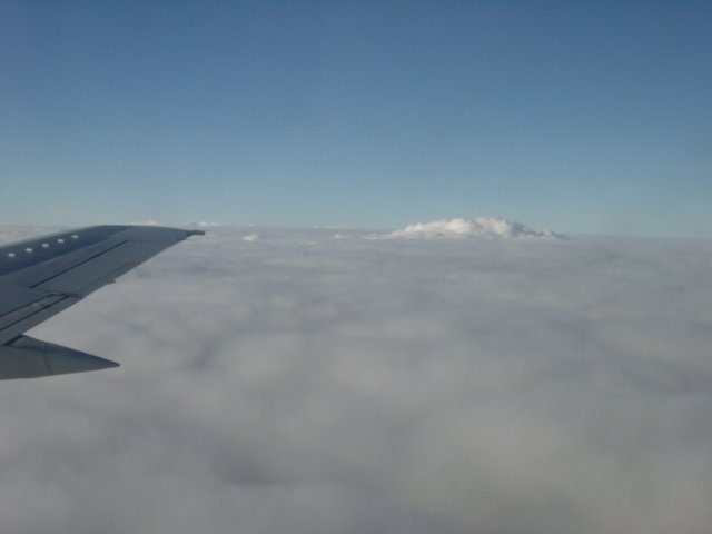 In the plane to CDG: an island of clouds on a sea of clouds