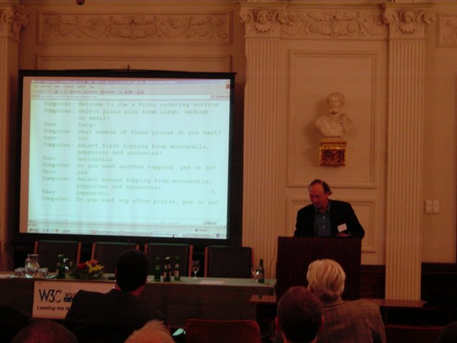 Vincent presenting the pizza order example 