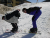 Pticul et Bi quasiment "emboites", en position aerodynamique sur ses patinettes