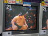 In an electronics superstore: Sumo on TV