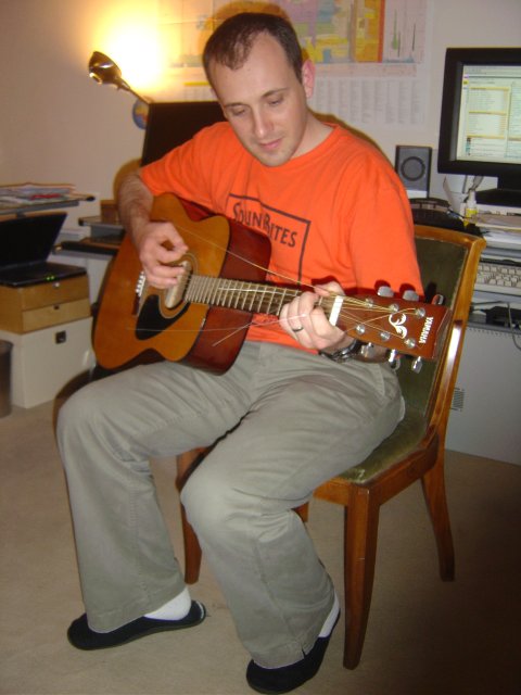 Hugo playing guitar