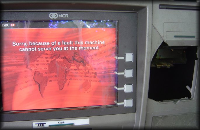 Punctured ATM: "Sorry, because of a fault this machine cannot serve you at the moment"