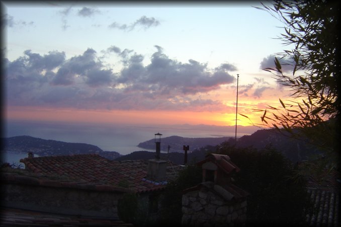 The sun sets behind Villefranche sur Mer