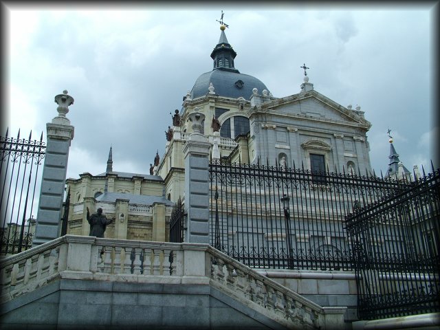 Catedral de La Almudena next to Palacio Real. The statue is that of John Paul II.