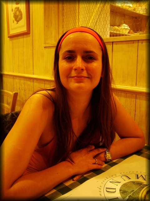 Isabelle in the Terra Mundi restaurant (that we happen to *not* recommend), waiting to order lunch.