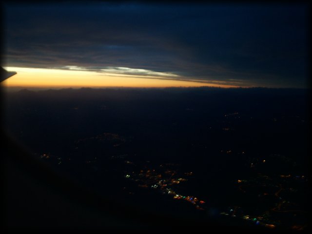 About to land in Nice. The sun has almost set and we see the lights from Cannes below.