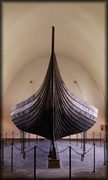 The Gokstad Ship at the Viking Ship Museum.  <em>The Gokstad Ship was found in a large burial mound at the Gokstad farm in Sandar, Vestfold in 1880. The ship had been built around 890 A.D. and later used in the ship burial of an important chieftain who died in or around 900 A.D. The ship, built of oak, is 24 meters long , 5 meters wide and is the largest of the three ships in the museum. It could accomodate 32 oarsmen and was much more sturdily built than the Oseberg ship. The keel and mast step are sturdier and the ship's sides are higher, with two strakes above the oar holes. The oar holes could be hatched down when the ship was under sail. Using a square sail of 110 sq. m., the ship could reach speeds of over 12 knots.  Just how seaworthy it had been, was demonstrated when a copy of the Gokstad Ship sailed the Atlantic from Bergen to the World's Fair in Chicago in 1893.</em>  <em>During the excavations, the skeleton was recovered of a male aged between 50-70 years. The skeleton was found in a bed in a timber-built burial chamber. Although the identity of the person buried is unknown, it has been suggested that it is that of Olaf Geirstad-Alf, a petty king of Vestfold.</em>