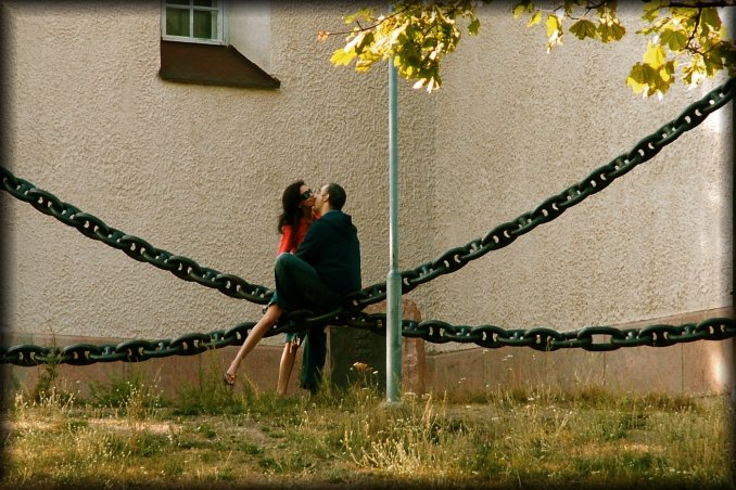 There were beautiful. I spotted them from a distance and zoomed in. I love the position of her body while she's being kissed and the movement of the heavy chains.