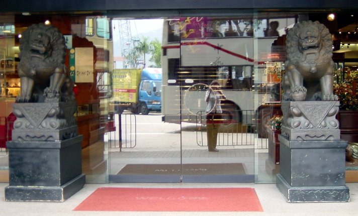 my reflection in the glass doors to the Chines Arts and Crafts Centre