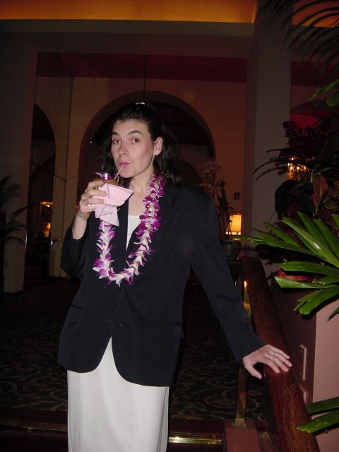 Christelle drinking a cocktail