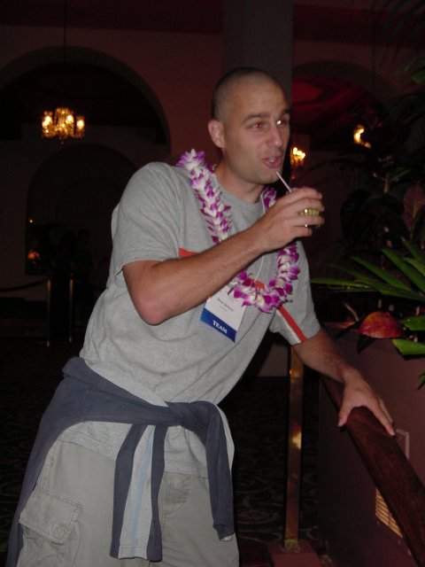 Dean drinking a cocktail