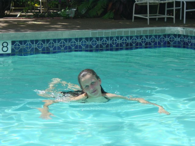 Caroline in the swimming pool, smiling this time