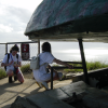 Christelle and Caroline squatting to return