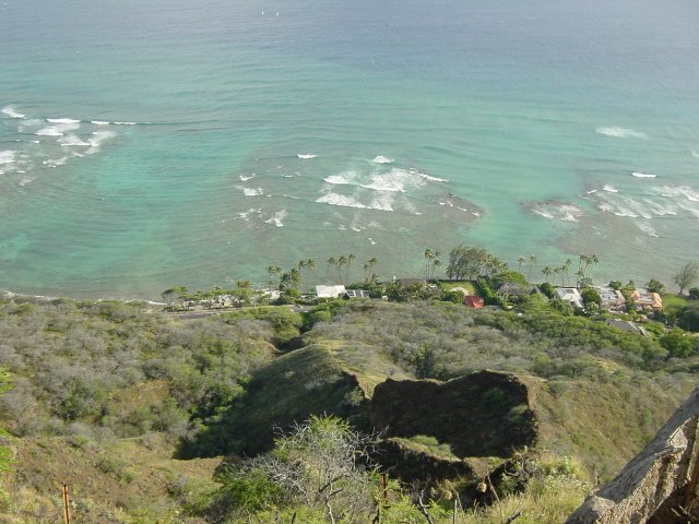 View on the waves and the houses on the shore