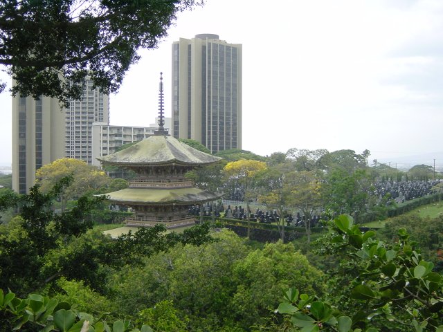 Pagoda, cemetary, buildings in the background