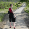 Coralie holding up the sleeves of her trousers