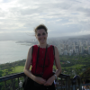 Coralie with a view of Waikiki beach in the back