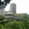 Pagoda, cemetary, buildings in the background
