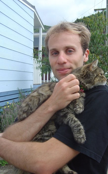 Nico found a kitty cat that is happy in his arms