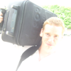 overexposure: ericP holding his suitcase on a shoulder
