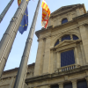 Flags (europe, catalunya, spain, unidentified) in front of the MNAC.