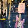 Hello Kitty! electric guitars in a shop window.